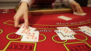 Filipino user reviewing slots and live game categories on a phone